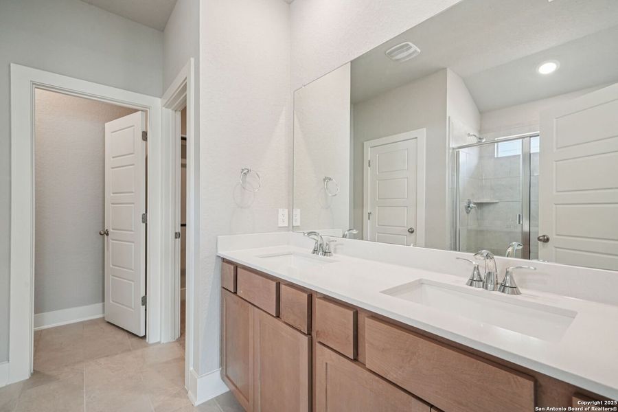 Furnished interior view inside a new home in Estancia Ranch - Classic Series, San Antonio (Image 11).