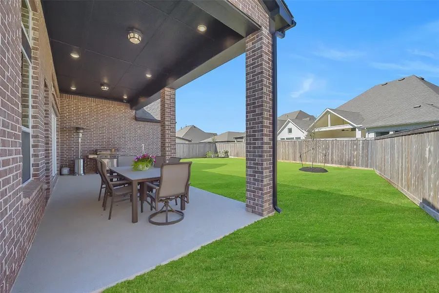 Exterior details and patio area of a home in , Cypress (Image 4).