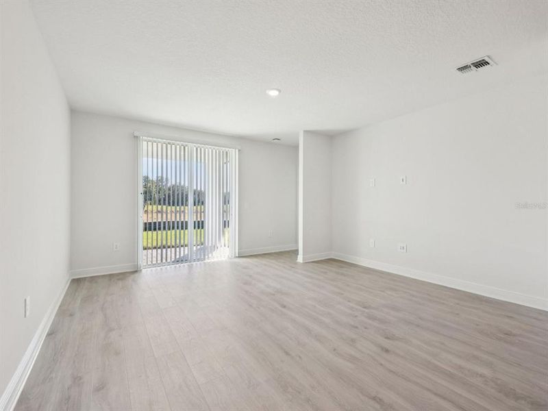 Spacious, unfurnished interior of a new home in The Reserve at Hammock Oaks - Classic Series, Lady Lake (Image 10). Spacious, unfurnished interior of a new home in The Reserve at Hammock Oaks - Classic Series, Lady Lake (Image 10).