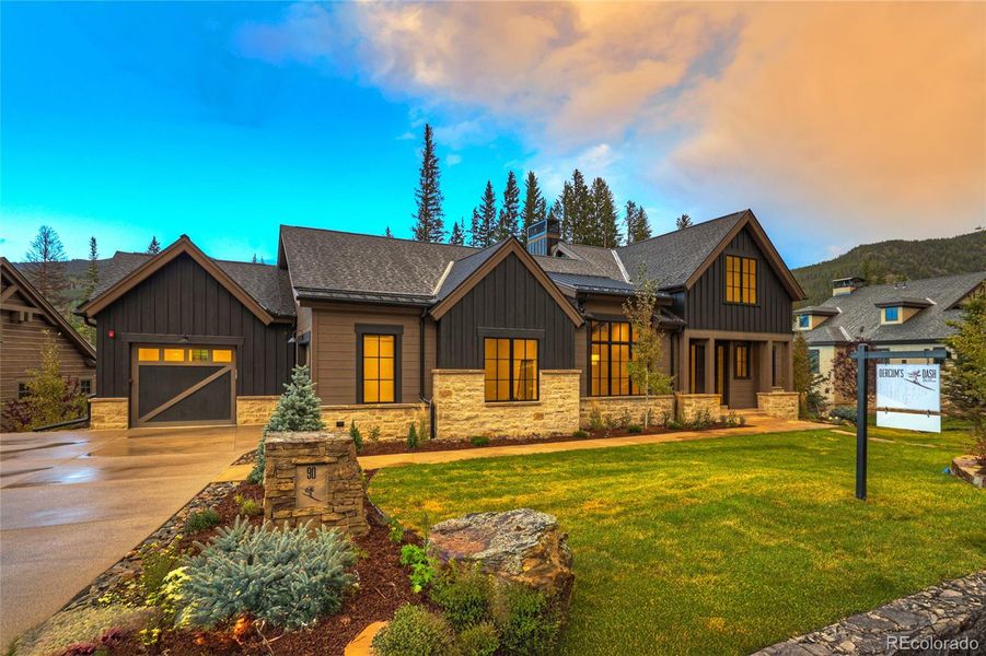 Front exterior of a new home in , Keystone, CO, highlighting curb appeal (Image 24).