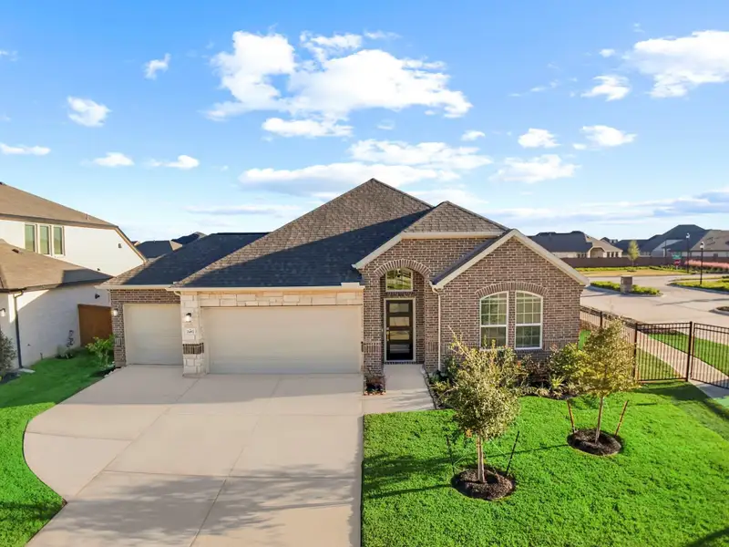 Beautiful brick-and-stone elevation with fresh landscaping and a wide driveway offering plenty of parking. This charming single-story home sits on a spacious corner lot and welcomes you with great curb appeal, a covered entryway, and an inviting presence from the moment you arrive! Beautiful brick-and-stone elevation with fresh landscaping and a wide driveway offering plenty of parking. This charming single-story home sits on a spacious corner lot and welcomes you with great curb appeal, a covered entryway, and an inviting presence from the moment you arrive!