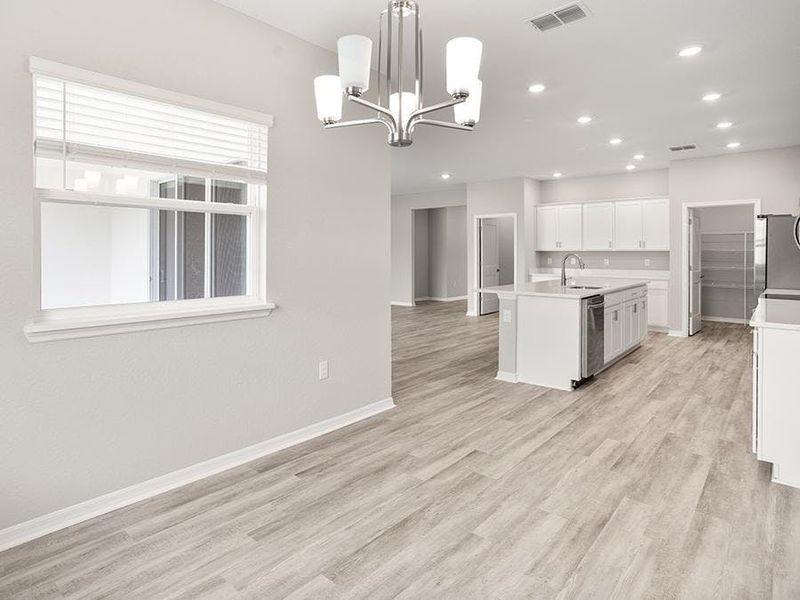 Meals are a delight in your sunny dining room - Everly by Highland Homes