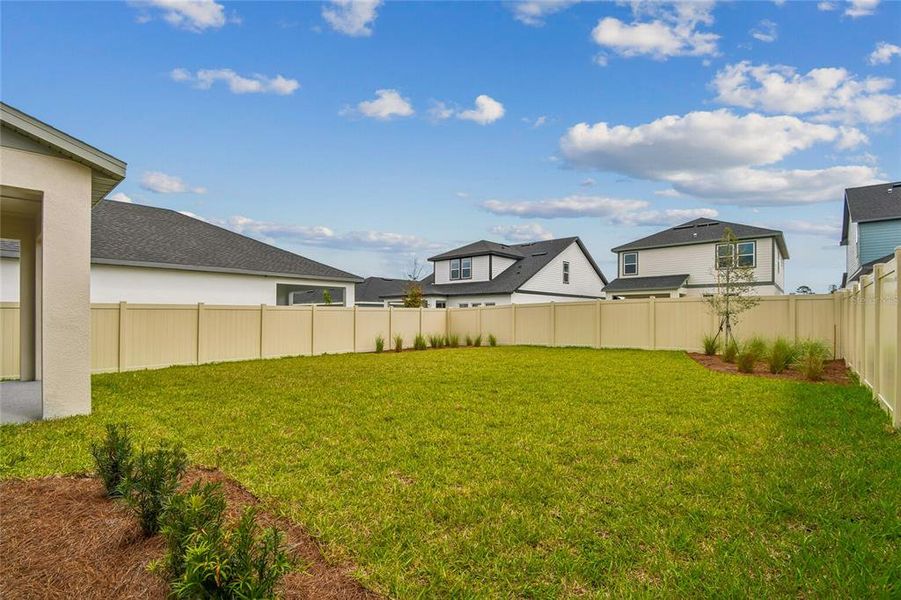 Exterior details and patio area of a home in Oakfield at Mount Dora Cottage Series, Mount Dora (Image 20).