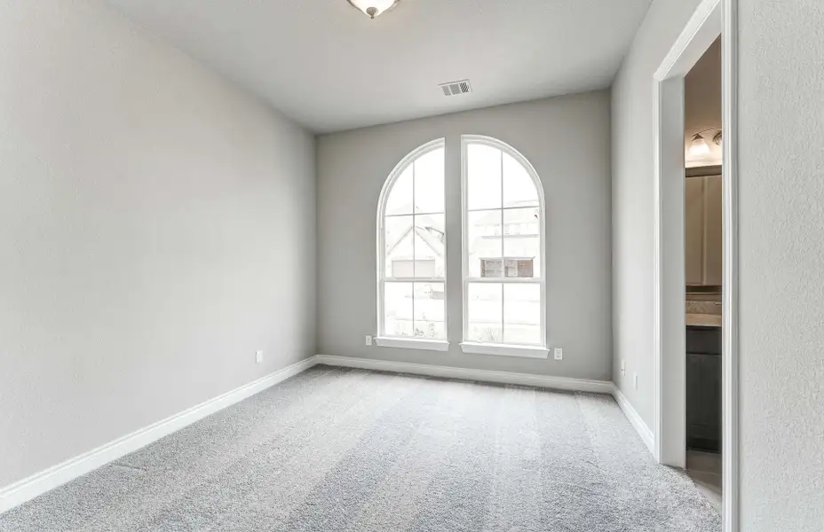 Representative unfurnished interior of a home built from the 2909 by Ravenna Homes in The Woodlands Hills 65′, Willis (Image 34). Representative unfurnished interior of a home built from the 2909 by Ravenna Homes in The Woodlands Hills 65′, Willis (Image 34).