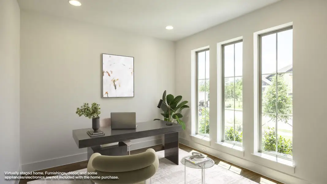 Home office with plenty of natural light, recessed lighting, and wood finished floors Home office with plenty of natural light, recessed lighting, and wood finished floors