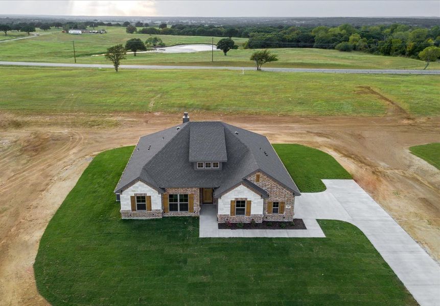 Representative exterior photo of a completed home built from the The Aubrey by Doug Parr Custom Homes in Honeysuckle Ranch, Paradise, TX (Image 20). Representative exterior photo of a completed home built from the The Aubrey by Doug Parr Custom Homes in Honeysuckle Ranch, Paradise, TX (Image 20).