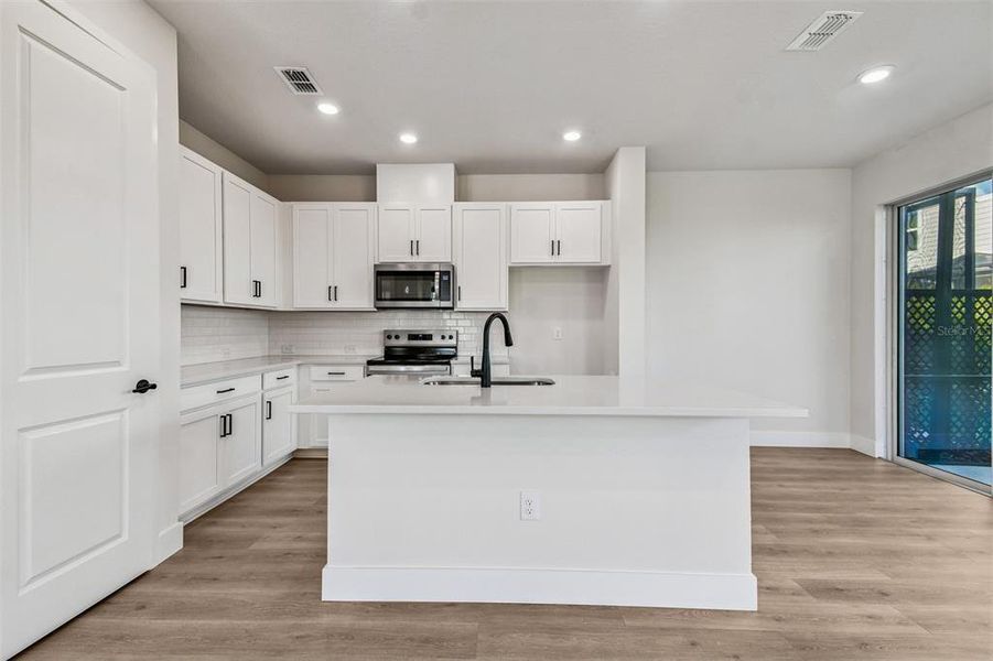 Furnished interior view inside a new home in North River Ranch – Townhomes, Parrish (Image 9).