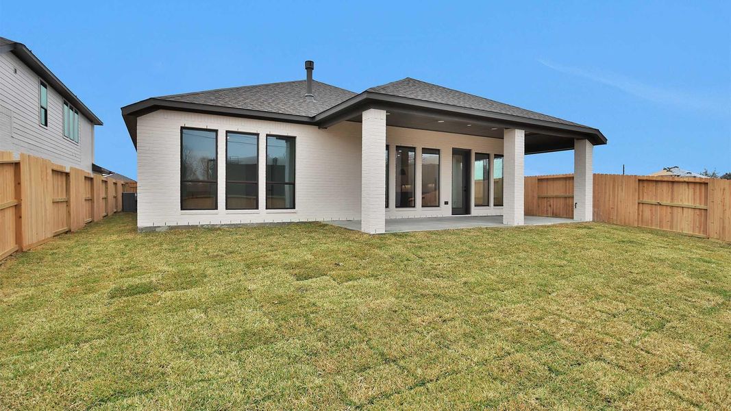 Exterior details and patio area of a home in Sienna, Missouri City (Image 4). Exterior details and patio area of a home in Sienna, Missouri City (Image 4).