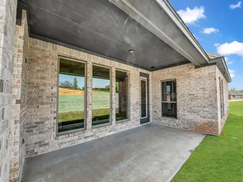 Exterior details and patio area of a home in , Springtown (Image 4).