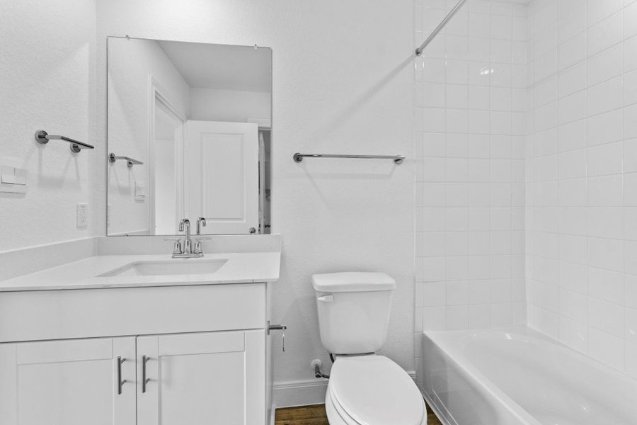 Furnished interior view inside a new home in Railhead, Cedar Creek (Image 6).