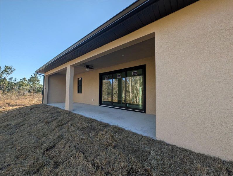 Exterior details and patio area of a home in , Lehigh Acres (Image 11).