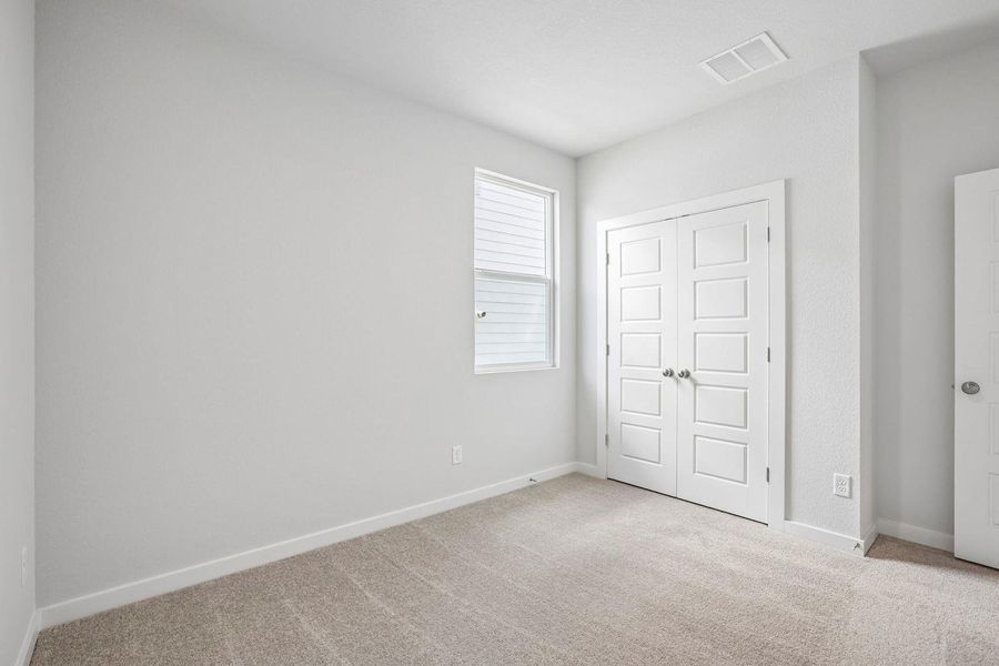 Spacious, unfurnished interior of a new home in Stallion Run, Buda (Image 23).