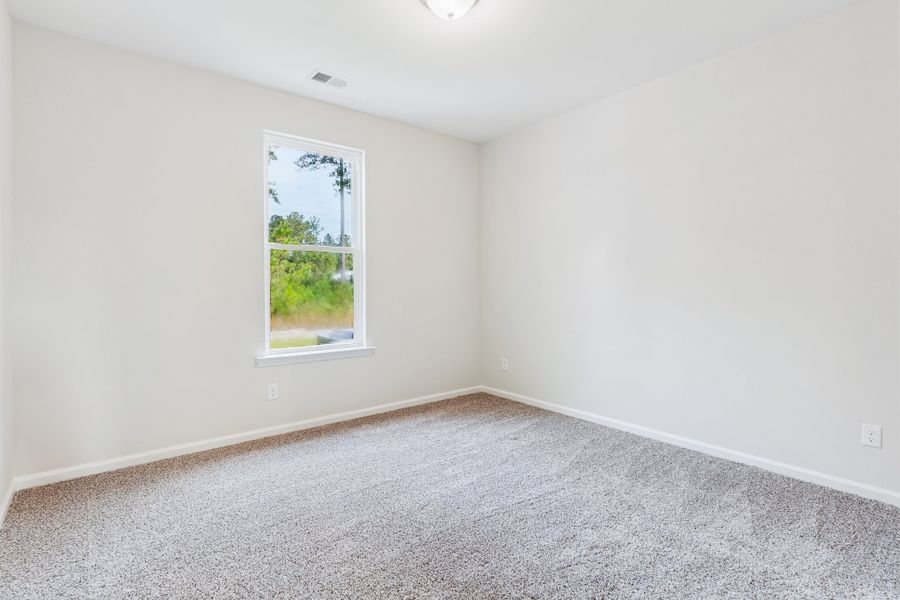 Representative unfurnished interior of a home built from the The Athens + Bonus Room by Smith Family Homes in NorthShore on the St. Marys River, Kingsland (Image 19).