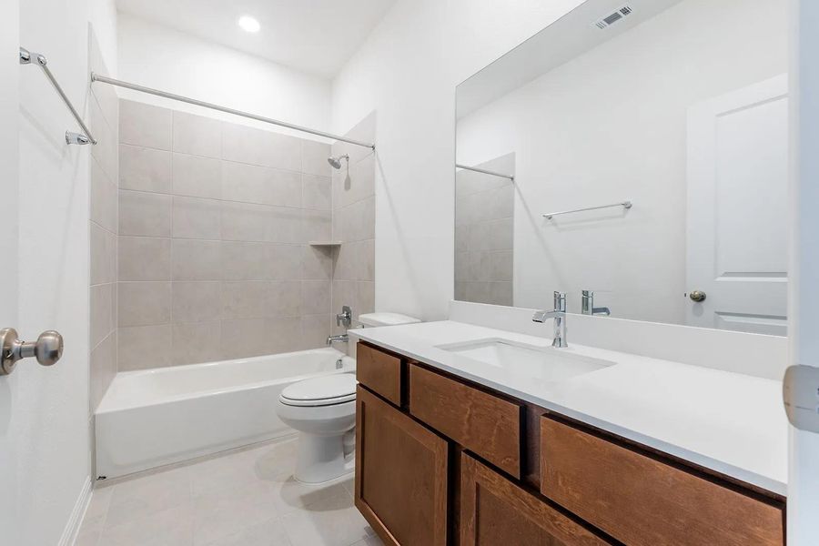 Furnished interior view inside a new home in The Colony - 50', Bastrop (Image 11).