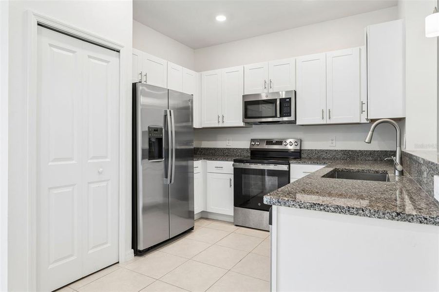 Furnished interior view inside a new home in Angeline, Land O' Lakes (Image 15).