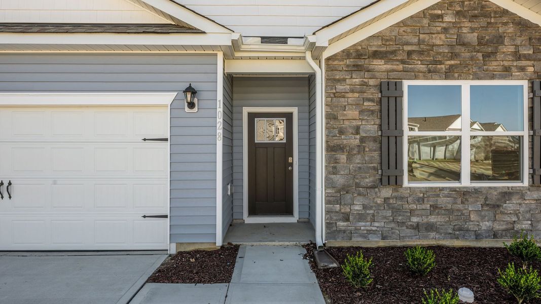 Exterior details and patio area of a home in West New Bern, New Bern (Image 3).