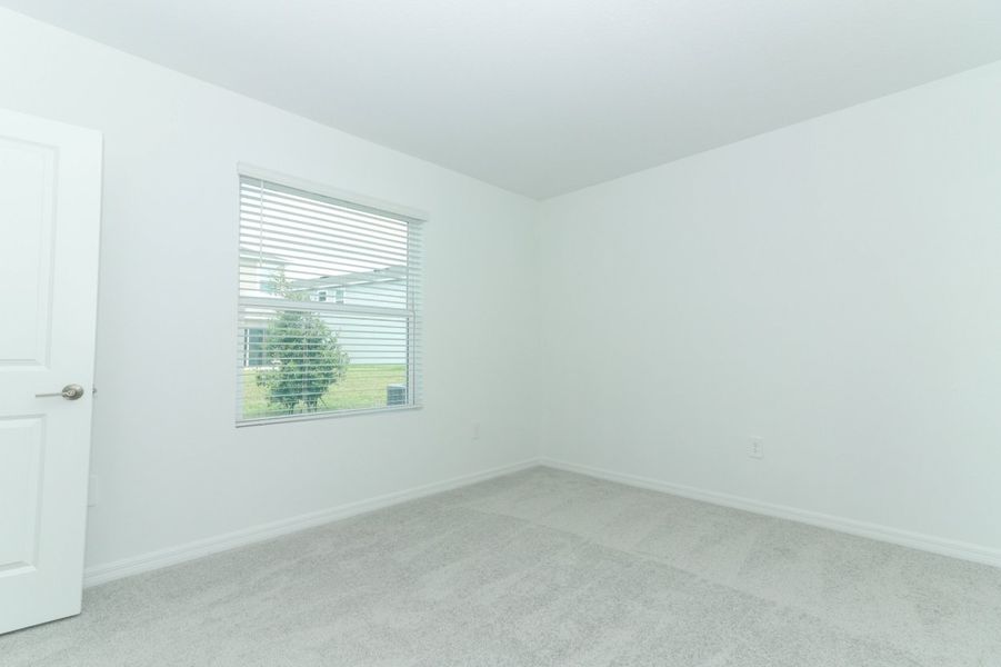 Spacious, unfurnished interior of a new home in Marion Creek, Haines City (Image 25).