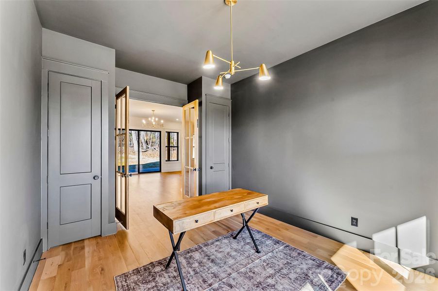 Dedicated home office with two closets, providing flexibility for work, storage or a creative retreat.