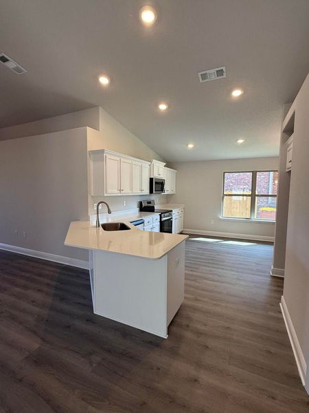 Furnished interior view inside a new home in Ridgeway Landing, Crestview (Image 3).