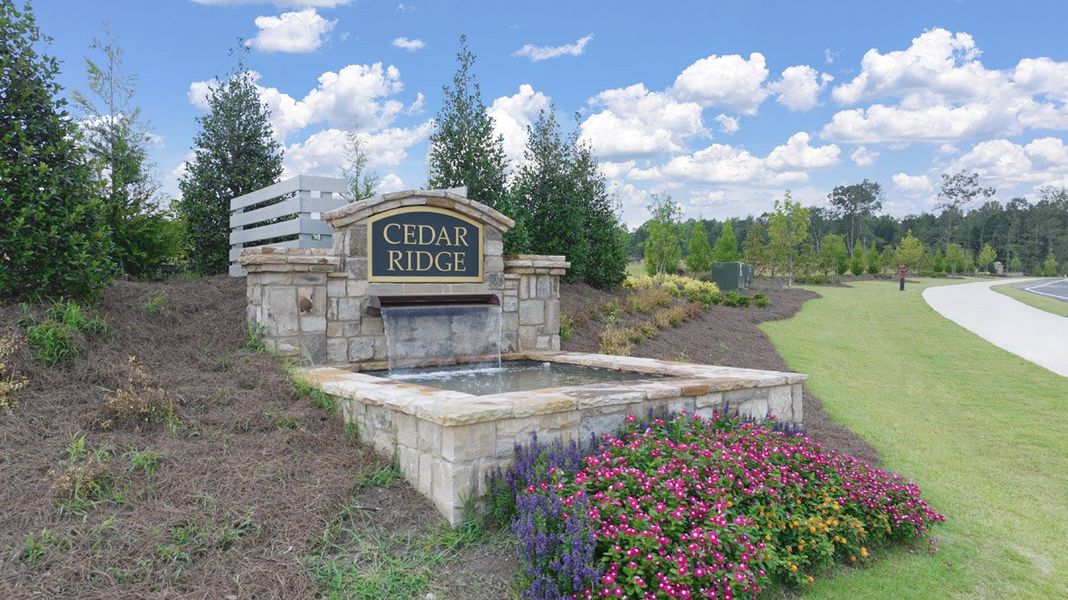 Front exterior of a new home in Locust Grove Station - Cedar Ridge, Locust Grove, GA, highlighting curb appeal (Image 25).