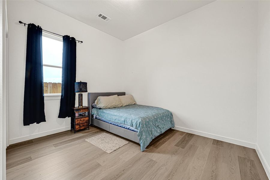 Furnished interior view inside a new home in , Conroe (Image 7).