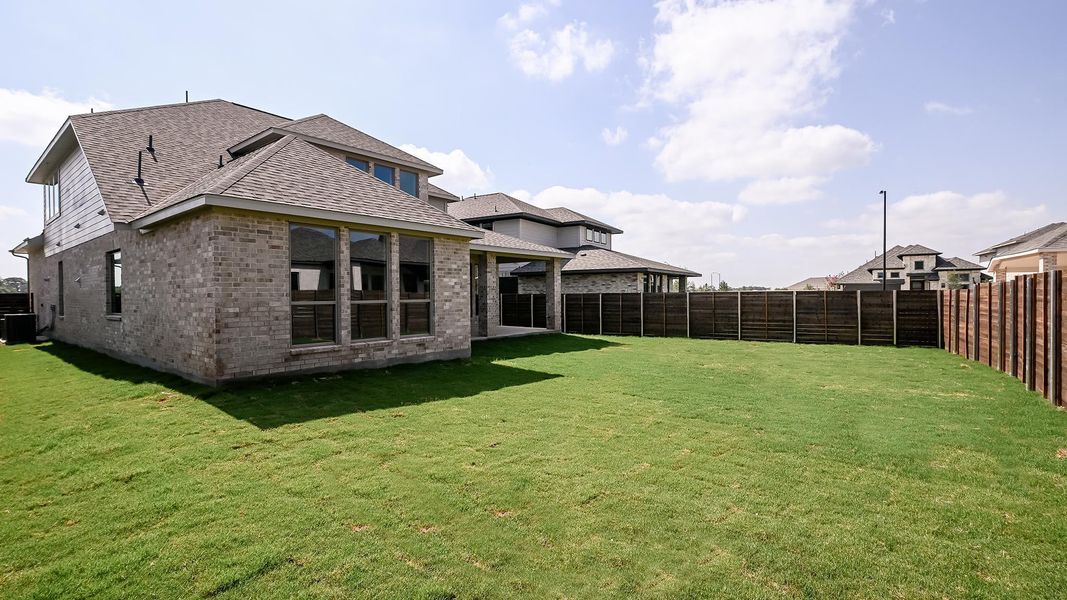 Exterior details and patio area of a home in Juniper Springs, Lockhart (Image 3).