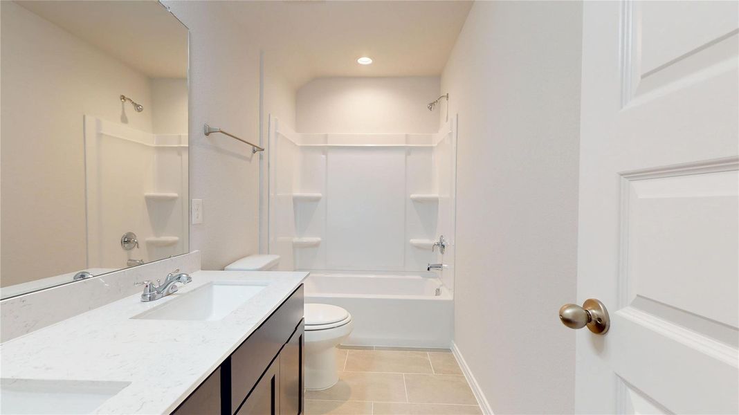 Primary en suite complete with two dual sinks Primary en suite complete with two dual sinks