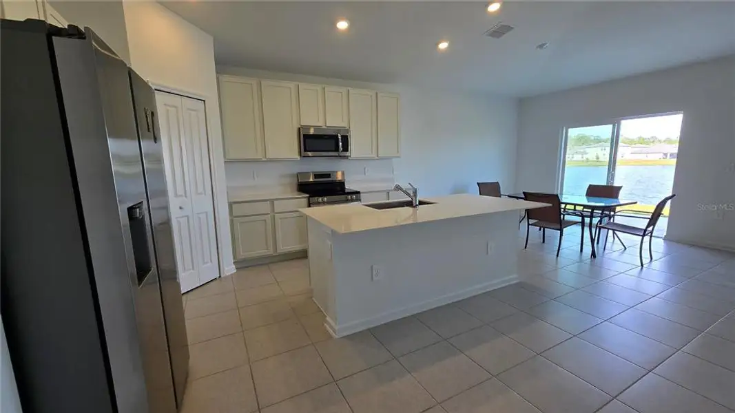 Furnished interior view inside a new home in , Kissimmee (Image 4).