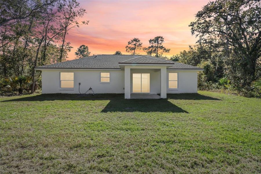 Exterior details and patio area of a home in , Ocklawaha (Image 3).