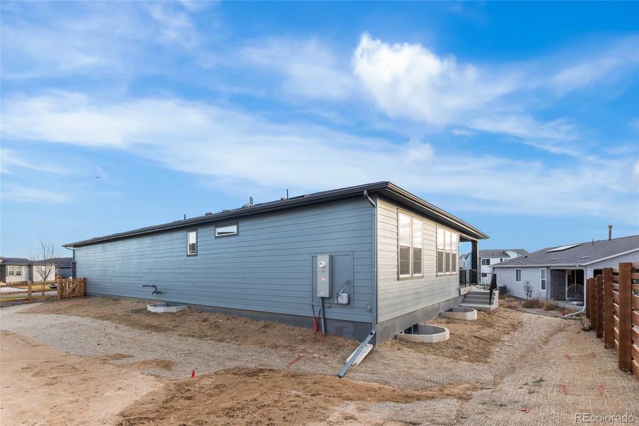 Exterior details and patio area of a home in The Aurora Highlands, Aurora (Image 21).