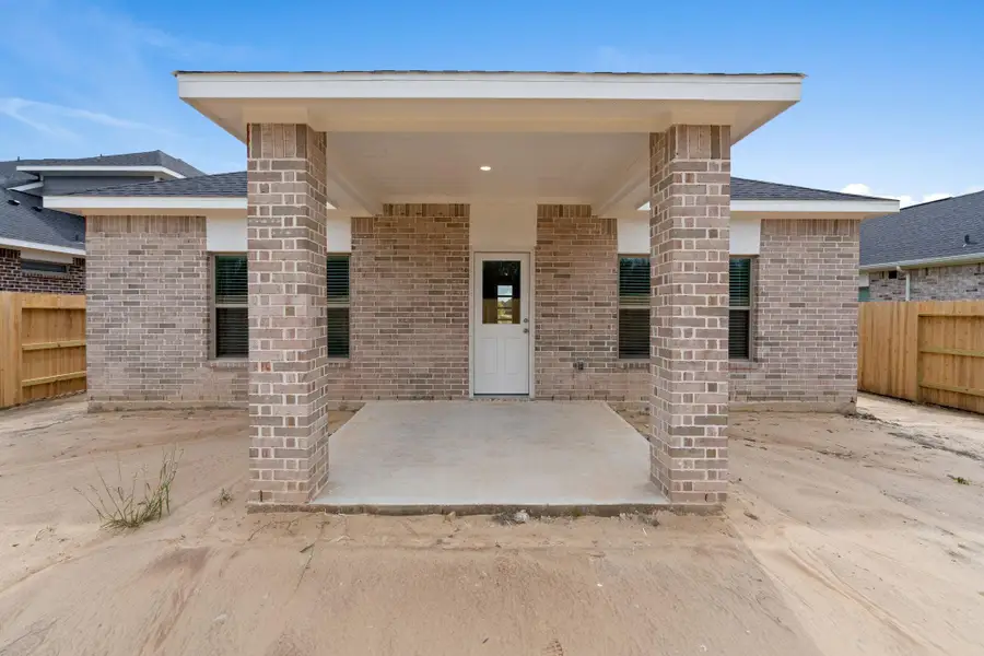 Exterior details and patio area of a home in Laurel Landing, Alvin (Image 3). Exterior details and patio area of a home in Laurel Landing, Alvin (Image 3).