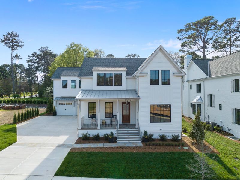 Representative exterior photo of a completed home built from the Grace by Homes by Dickerson in The Founding at Blue Ridge, Raleigh, NC (Image 25). Representative exterior photo of a completed home built from the Grace by Homes by Dickerson in The Founding at Blue Ridge, Raleigh, NC (Image 25).
