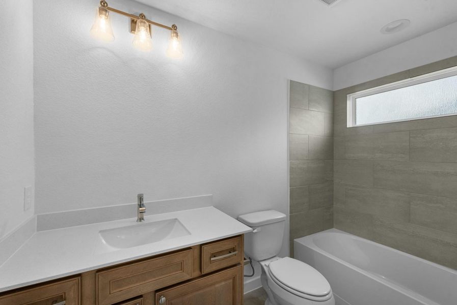 Furnished interior view inside a new home in Briarwood Crossing, Rosenberg (Image 9).