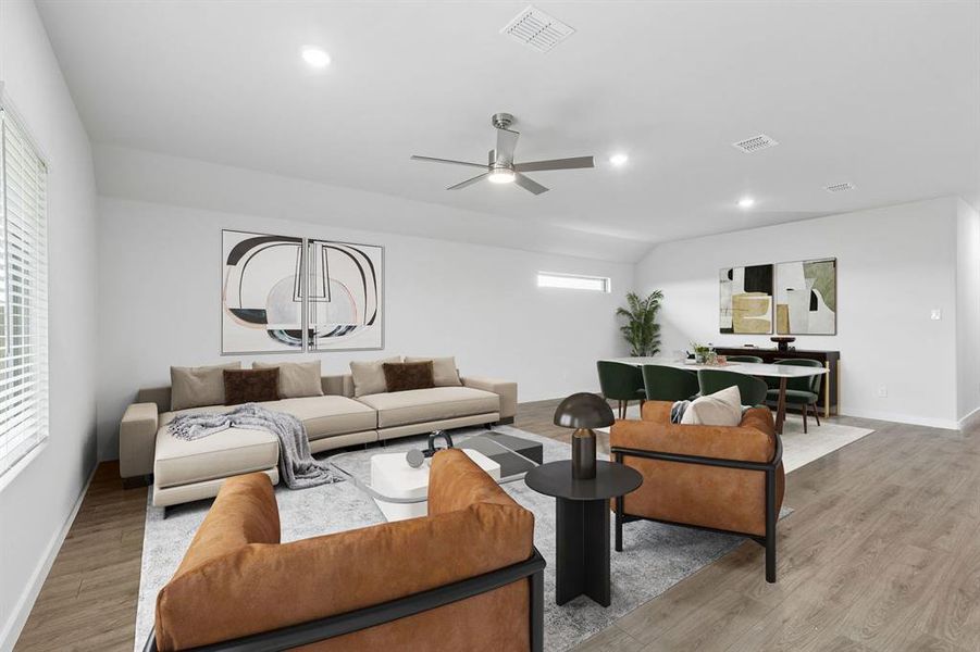 Living and Dining Rooms in the Oscar home plan by Trophy Signature Homes – REPRESENTATIVE PHOTO