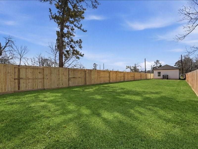 Exterior details and patio area of a home in , Houston (Image 4).
