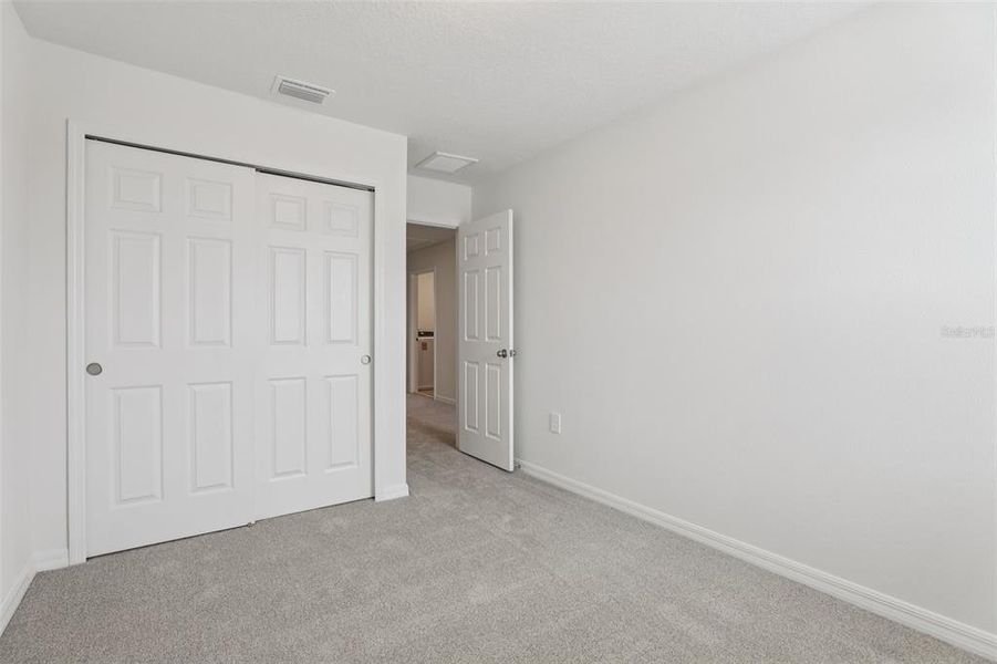 Spacious, unfurnished interior of a new home in Cagan Crossings West, Clermont (Image 32).