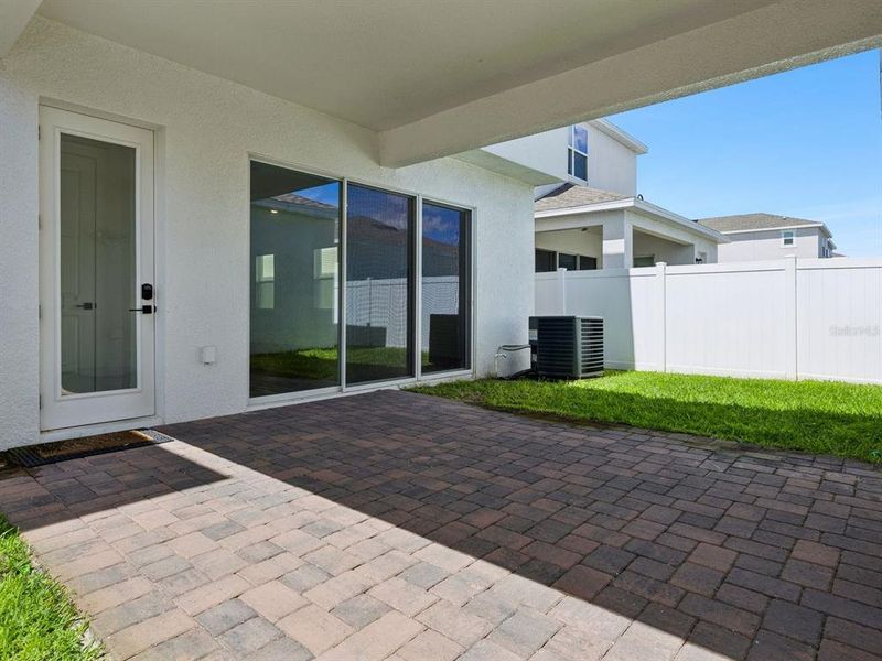 Exterior details and patio area of a home in Osprey Ranch, Winter Garden (Image 4).