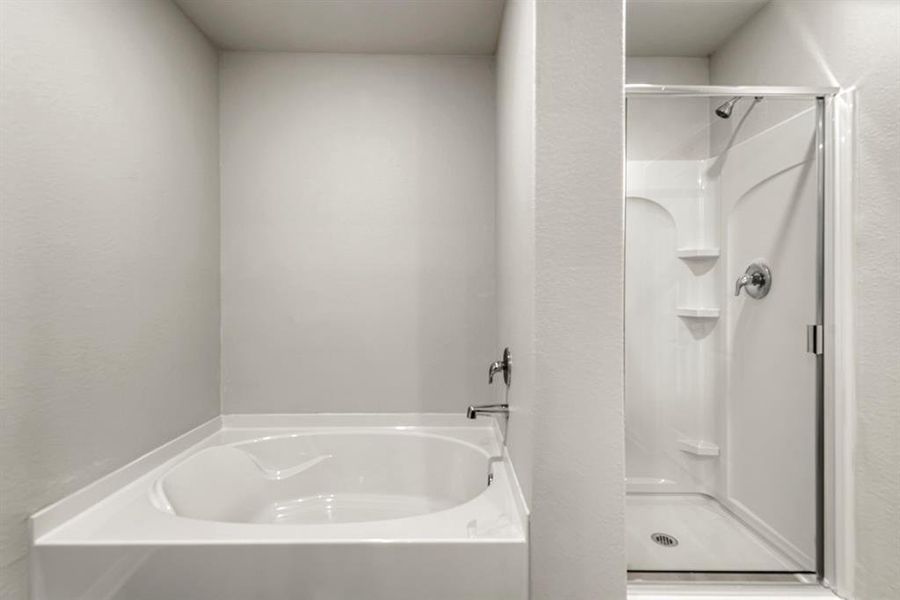 The en-suite master bathroom includes a soaking tub to provide you with an at home spa experience.