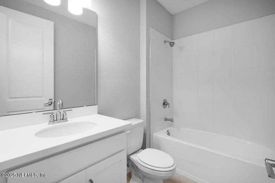 Furnished interior view inside a new home in Colbert Landings, Palm Coast (Image 13).