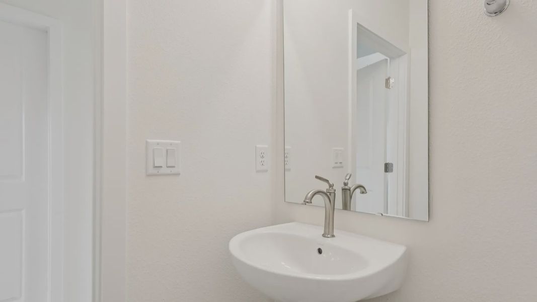 Half Bath in the Naples Floor Plan by DRB Homes Half Bath in the Naples Floor Plan by DRB Homes
