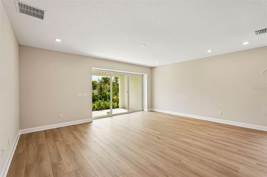 Spacious, unfurnished interior of a new home in Tiburon, Nokomis (Image 36).