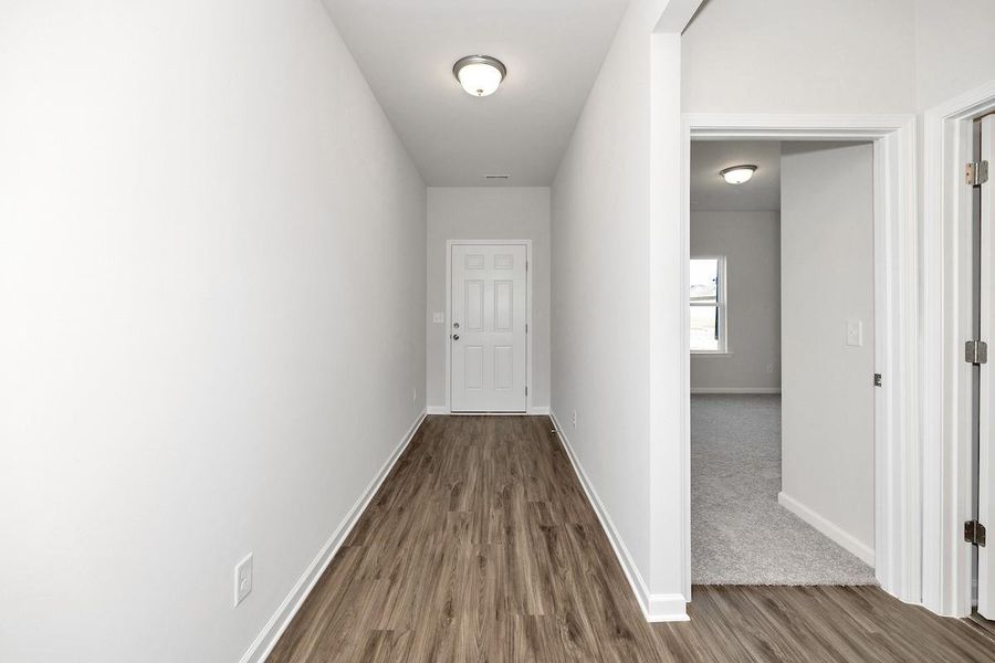 The Avery- Extended Foyer. Home under construction. Sample floor plan photo used for illustrative purposes only. Upgrades, selections options, and colors will vary.