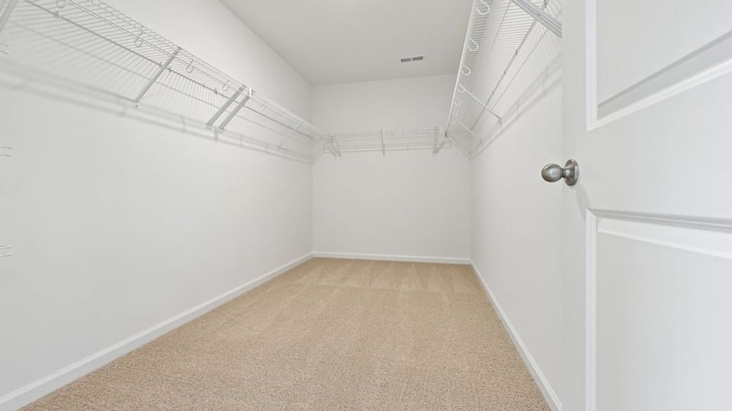 Representative unfurnished interior of a home built from the Summit by D.R. Horton in Kalas Falls, Wake Forest (Image 27).