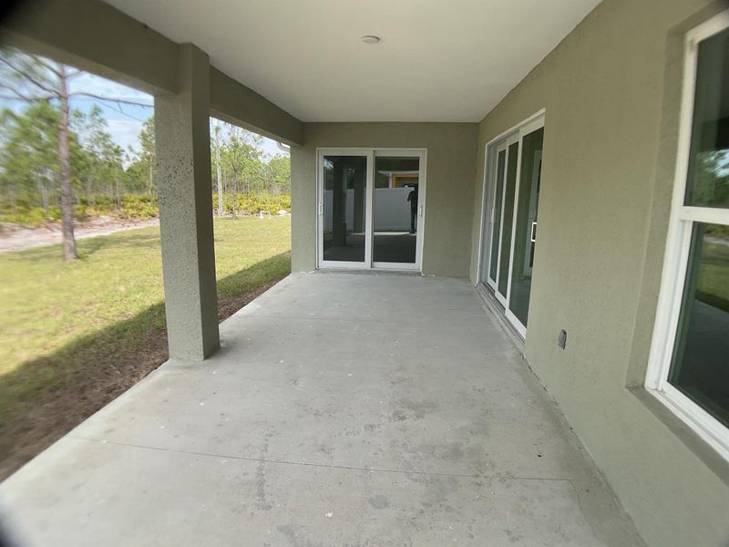 Front exterior of a new home in , Punta Gorda, FL, highlighting curb appeal (Image 2).