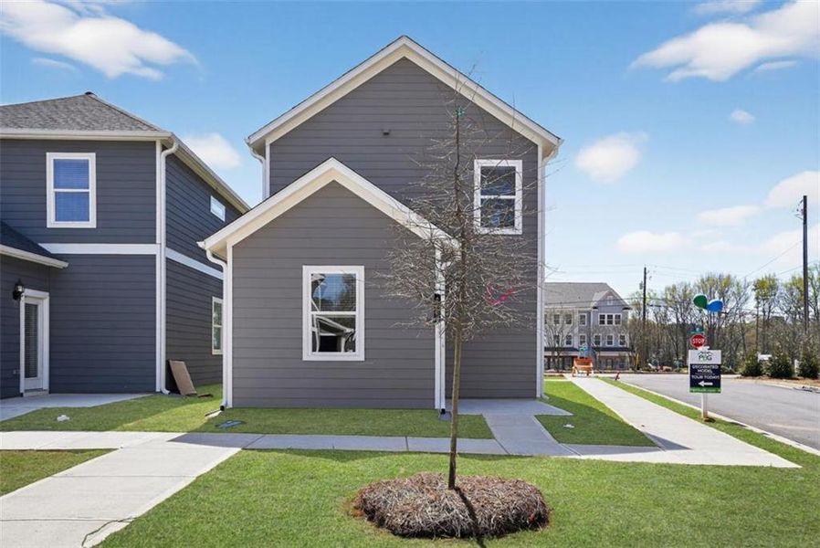 Front exterior of a new home in , Fayetteville, GA, highlighting curb appeal (Image 17).