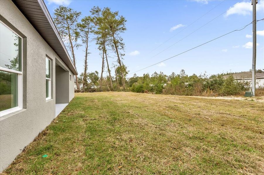 Exterior details and patio area of a home in , Ocala (Image 22).