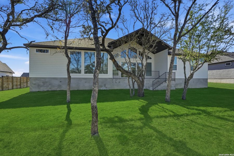 Exterior details and patio area of a home in Potranco Oaks, Castroville (Image 27).