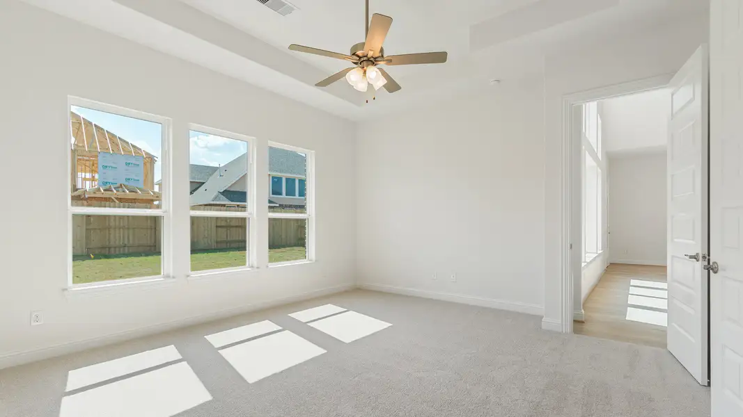 Representative furnished interior of a home built from the Vanderbilt by DRB Homes in Creekhaven, Iowa Colony (Image 10).