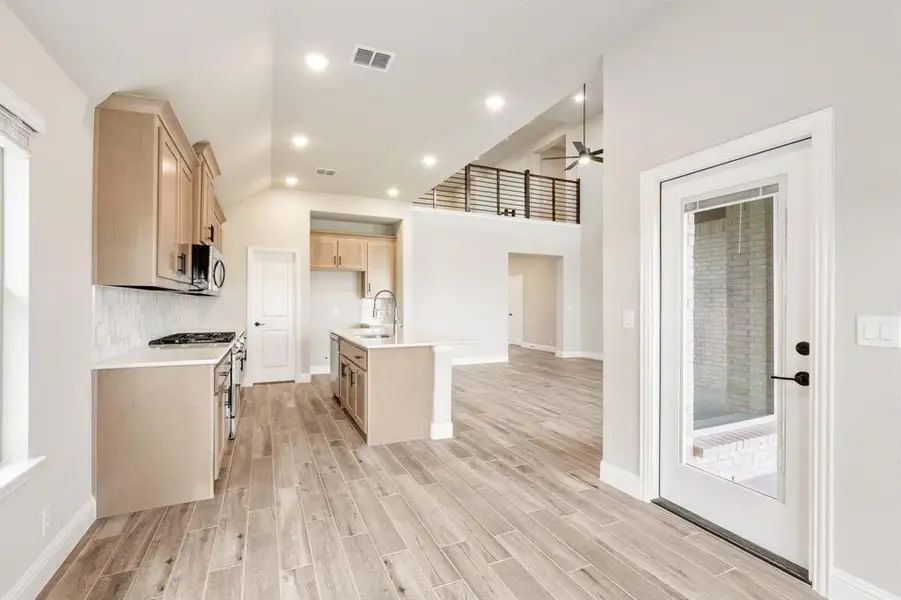 Furnished interior view inside a new home in Devonshire, Forney (Image 8).