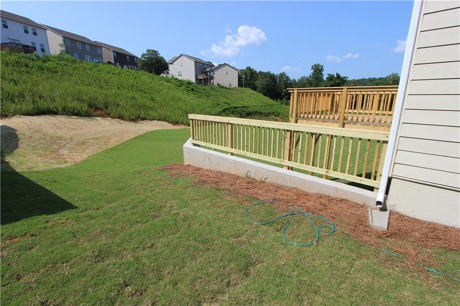 Exterior details and patio area of a home in Clark Farms, Flowery Branch (Image 15).